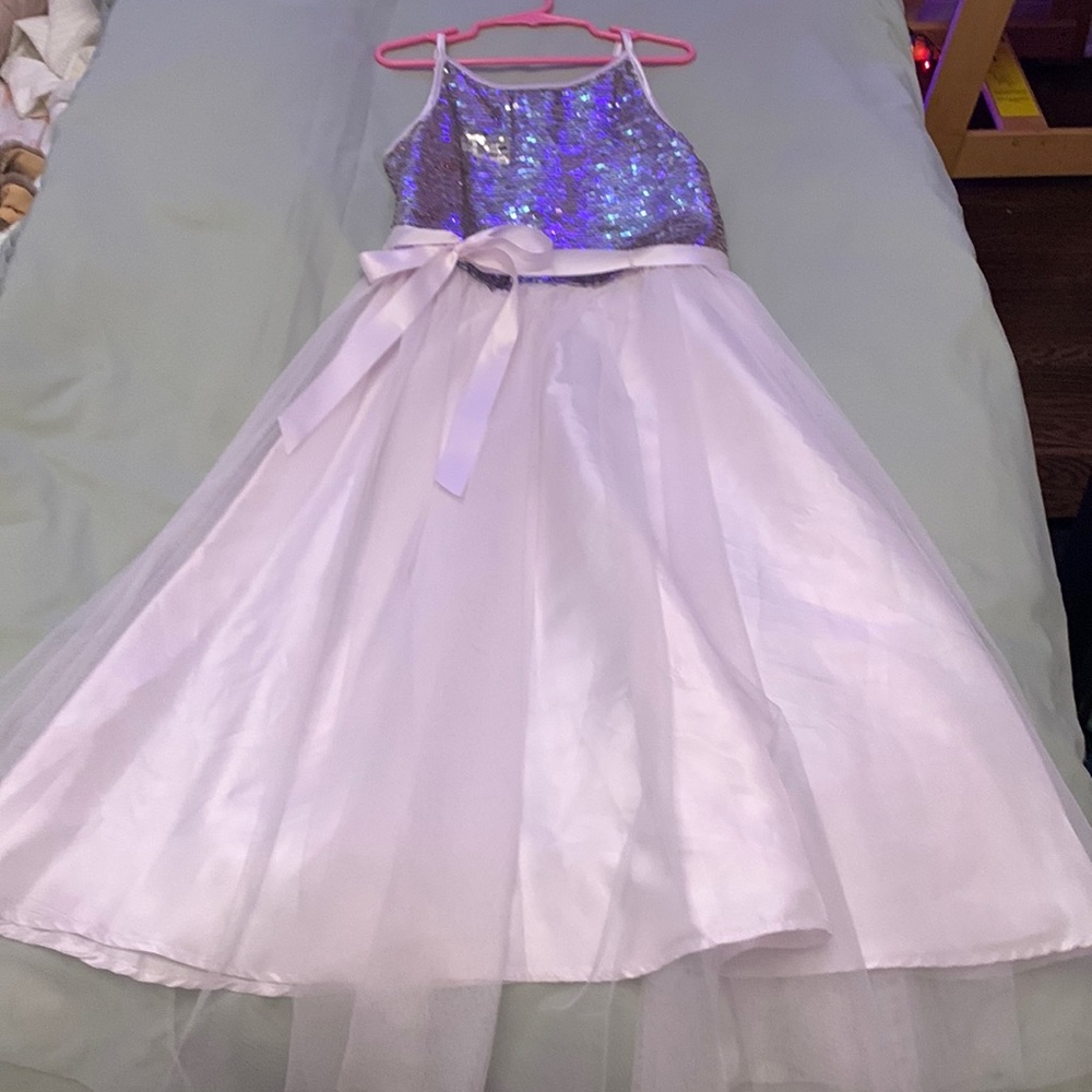 Girls size 8 light lilac with flip sequin top and a satin ribbon.